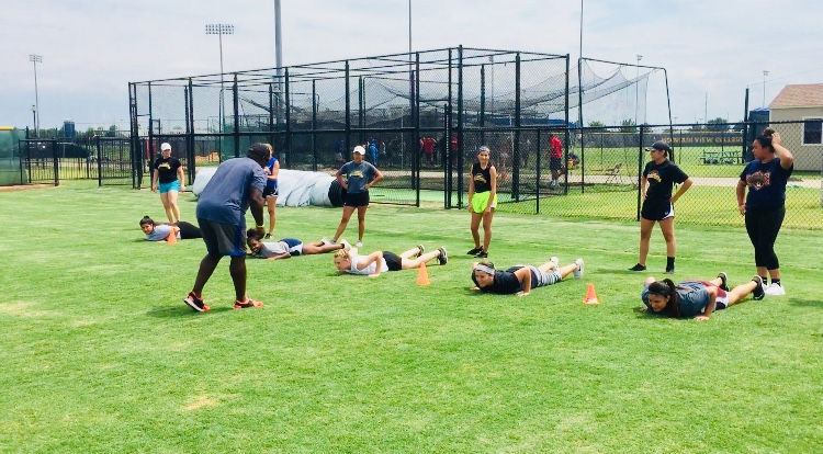 Coach E working on acceleration with the Lady Lions.